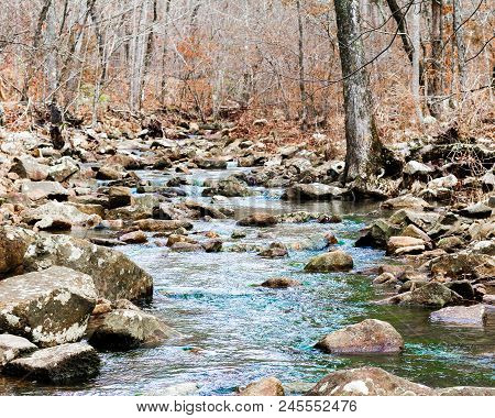 Water Runs Downstream In A Wooded Area Of South Western Oklahoma