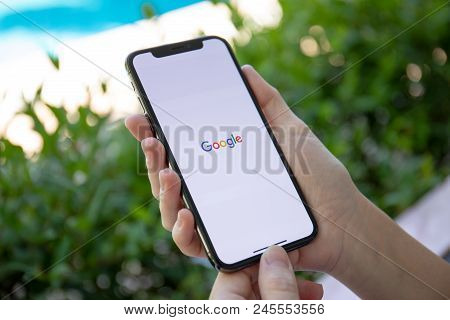 Koh Samui, Thailand - March 21, 2018: Woman Holding Iphone X With Social Networking Service Google O