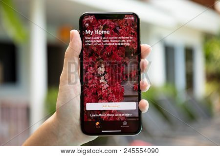 Koh Samui, Thailand - March 30, 2018: Woman Hand Holding Iphone X With App Home In The Screen. Iphon
