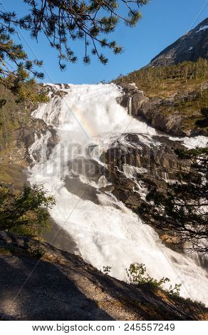 Photo Of Rapid Stunning Waterfall In Husedalen Valley, Norway. Aerial View. Summer Time.