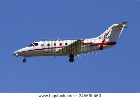 Borispol, Ukraine - May 26, 2018: G-skbd Raytheon Hawker 400xp Aircraft On The Blue Sky Background