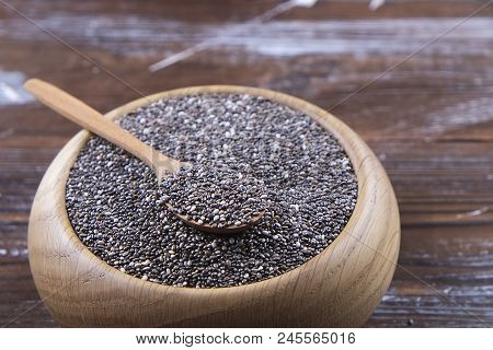 Minimalistic Composition With Chia Seeds On Table. Healthy Nutritious Food.