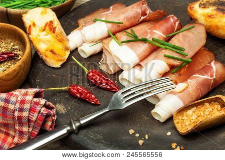 Thinly Sliced German Black Forest Ham With Sliced Ciabatta Bread. Sliced And Smoked Ham With Schwarz