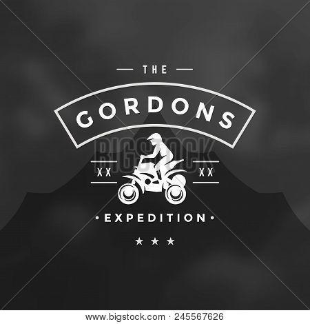 Atv Logo Emblem Vector Illustration. Off Road Mountains Expedition, Quad Bike And Man Silhouette Shi