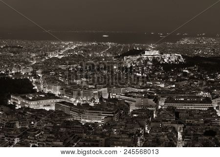 Athens skyline at night viewed from Mt Lykavitos with Acropolis, Greece.