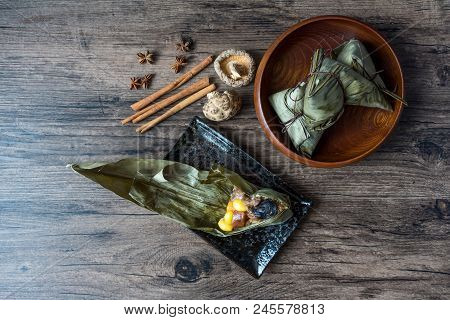 Zongzi Or Traditional Chinese Sticky Rice Dumplings Made Of Glutinous Rice Stuffed With Different Fi