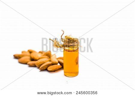 Close Up Of Extracted Oil Of Almond Or Badam Used As Hair Oil For Good And Thicker, Strong Black Hai