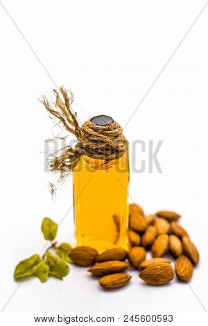 Close Up Of Extracted Oil Of Almond Or Badam Used As Hair Oil For Good And Thicker, Strong Black Hai
