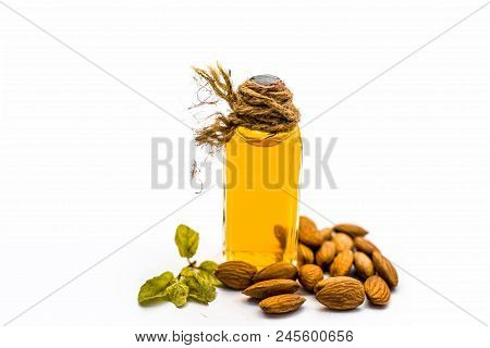 Close Up Of Extracted Oil Of Almond Or Badam Used As Hair Oil For Good And Thicker, Strong Black Hai
