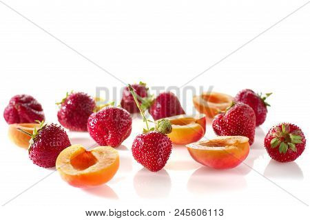 Berries: Strawberries, Blueberries, Apricot, Fruits On A White Background Close-up