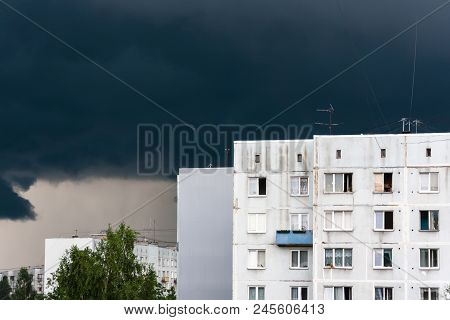 Dirty White Soviet-era Apartment House With Windows In A Storm