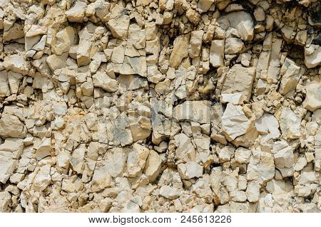 Textured Stone Background Rubble Ballast In Natural Form In The Rock Wall.