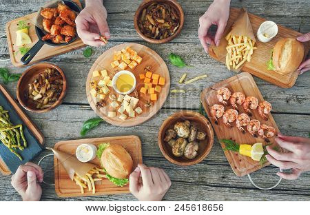 Top View Of Rustick Wooden Table With Food And Snack