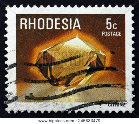 Rhodesia - Circa 1978: A Stamp Printed In Rhodesia Shows Citrine, Is Yellow Variety Of Quartz, Miner