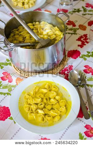 Traditional Italian Homemade Tortellini In Broth Soup. Real Italian Dinner In Countryside. Italian F