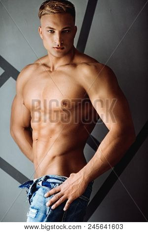 Young Sexy Muscular Man 
In A Studio
