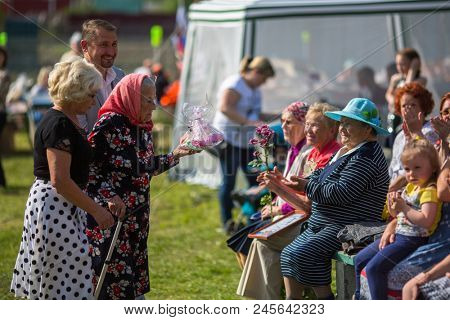 NIKOLSKIY / LENINGRAD REG, RUSSIA - JUN 16, 2018: During festival events dedicated to 69th anniversary of urban-type settlement Nikolskiy formation on the river Svir connecting Onega and Ladoga lakes.