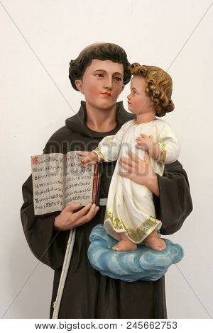 SISAK, CROATIA - DECEMBER 07: Saint Anthony of Padua holding child Jesus, statue in the Church of Holy Cross in Sisak, Croatia, on December 07, 2017.
