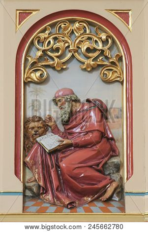 SISAK, CROATIA - DECEMBER 07: Saint Jerome, Great Doctor of the Western Church, pulpit in the Church of Holy Cross in Sisak, Croatia, on December 07, 2017.