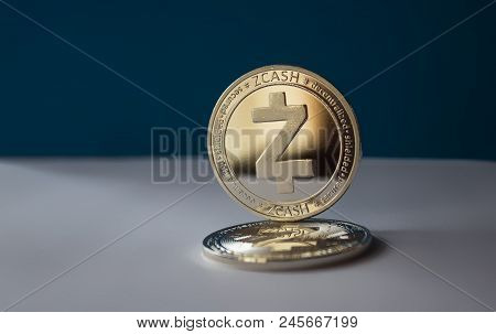 On A Blue Background Are Coins Of A Digital Crypto  Currency - Zcash. In Addition To The Lying Coin,