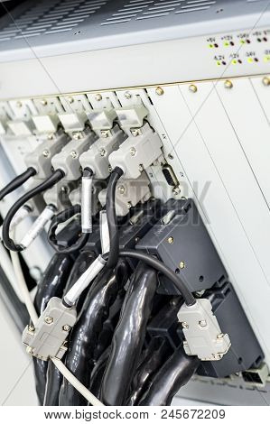 Electronic Module With A Lot Of Connected Cables And Connectors. Scientific And Laboratory Equipment