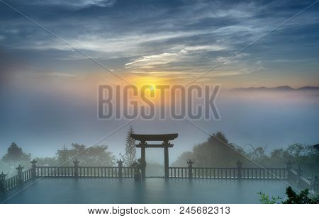 Bao Loc, Vietnam - May 15th, 2018: The Magical Dawn On The Pagoda, Surrounded By Dew And Magical Lig