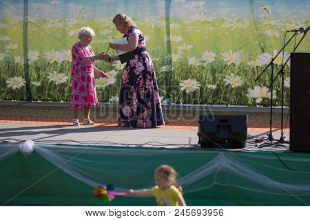 NIKOLSKIY / LENINGRAD REG, RUSSIA - JUN 16, 2018: During festival events dedicated to 69th anniversary of urban-type settlement Nikolskiy formation on the river Svir connecting Onega and Ladoga lakes.