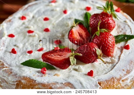 Strawberry Tart Covered With Whipped Sour Cream On A Wooden Tray Over Rustic Background, Close-up, S