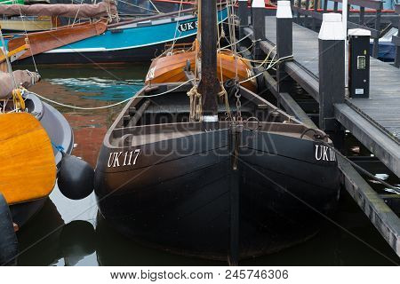 Urk, Netherlands - May 19, 2018: Traditional Wooden Fishing Boats In The Harbor Of Urk. Urk Is On Of