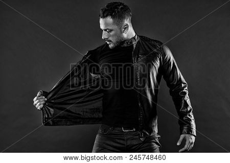 Fashion Model In Casual Style Clothes. Bearded Man Undress Leather Jacket. Man With Beard On Unshave