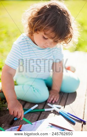 Adorable Little Girl Drawing With Felt-tip Pens Outdoors. Summer Leisure. Talantes Kids, Early Art E