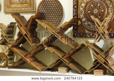 Store Of Ingenious Rihals. Wooden Book Stands In Bukhara, Uzbekistan. Holly Quran Kuran Koran Book H
