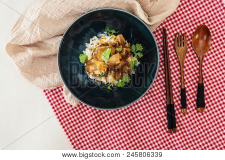 Vietnamese style caramel pork with rice and vegetable