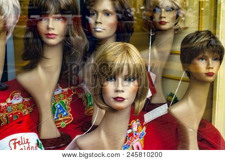 Malaga, Spain. December 26, 2107. Women Wigs In The Showcase