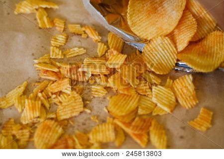 Crispy Crunchy Potato Chips Are A Great Party Munchies. Delicious Food Snack. Waved Rudged Fried Sli