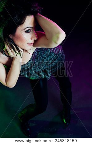 Young Caucasian Brunette Dancing. Top View. Studio Shot