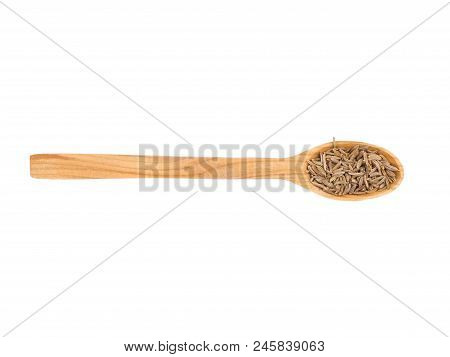 One Oval Spoon, Situated On The W.hite Background, Is Full Of Healthy Flax-seeds.