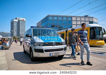 Berlin, Germany - June 09, 2018: Police Car And Passers-by On Alexanderplatz In Berlin. The Alexande
