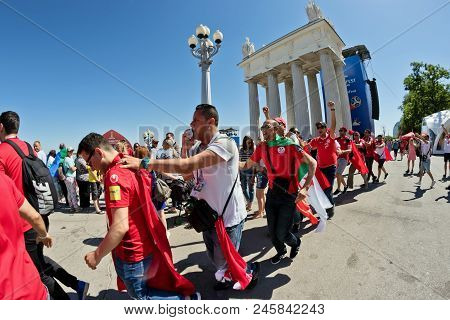 Football Fans Of The National Team Of Tunisia With National Flags And Attributes In Fanzone Fanfesta