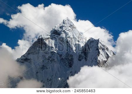 Mount Ama Dablam With Big Clouds And Blue Sky, Seen From Thok La Pass, Everest Base Camp Trek, Nepal