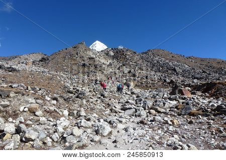 Trekkers Over A Difficult Pass Near Gorak Shep, Everest Base Camp Trek, Nepal