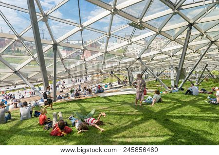 Moscow - June 17, 2018: People Relax In Modern Amphitheater With Glass Dome In Zaryadye Park Near Mo