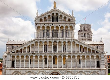 Pisan Romanesque facade of medieval Roman Catholic Pisa Cathedral at Piazza dei Miracoli (Piazza del Duomo), a famous UNESCO World Heritage Site in Pisa, Tuscany, Italy