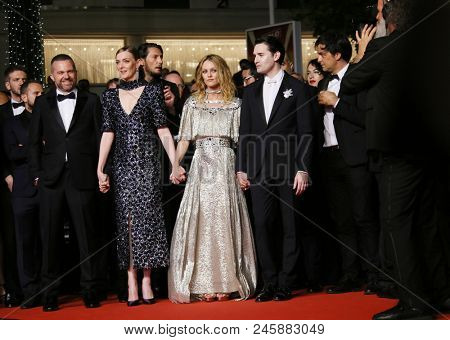 Yann Gonazalez, Vanessa Paradis and Nicolas Maury attend the screening of 'Knife + Heart (Un Couteau Dans Le Coeurr)' during the 71st  Cannes Film Festival at Palais on May 17, 2018 in Cannes, France.
