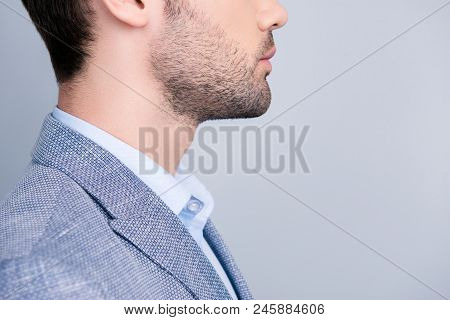 Side View Cropped Half Face  Profile Portrait With Copy Space Of Stunning Manly Manager In Suit With