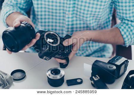 Cropped Close Up Non Face Portrait Of Man Assemble Camera After Repair Expertising, Having Lens Flas