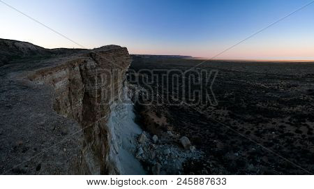 Panorama View To Aral Sea From The Rim Of Plateau Ustyurt Near Aktumsuk Cape At Sunset In Karakalpak