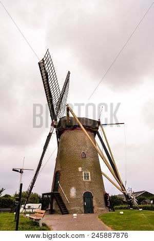 Photograph Of A Classic Vintage Windmill In Holland