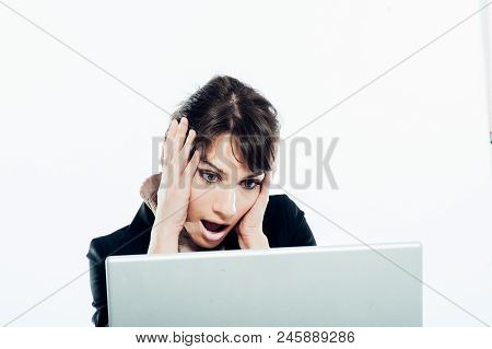 Young Caucasian Brunette Suit Dressed Business Woman Getting Surprised Working With Her Laptop Compu