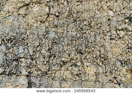 Textured Stone Background Rubble Ballast In Natural Form In The Rock Wall.